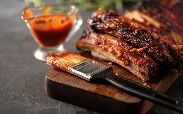 Tasty ribs basted in Big Rick's Bar-B-Q Sauce